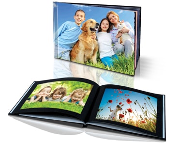 Sample photo book spread showing family portraits